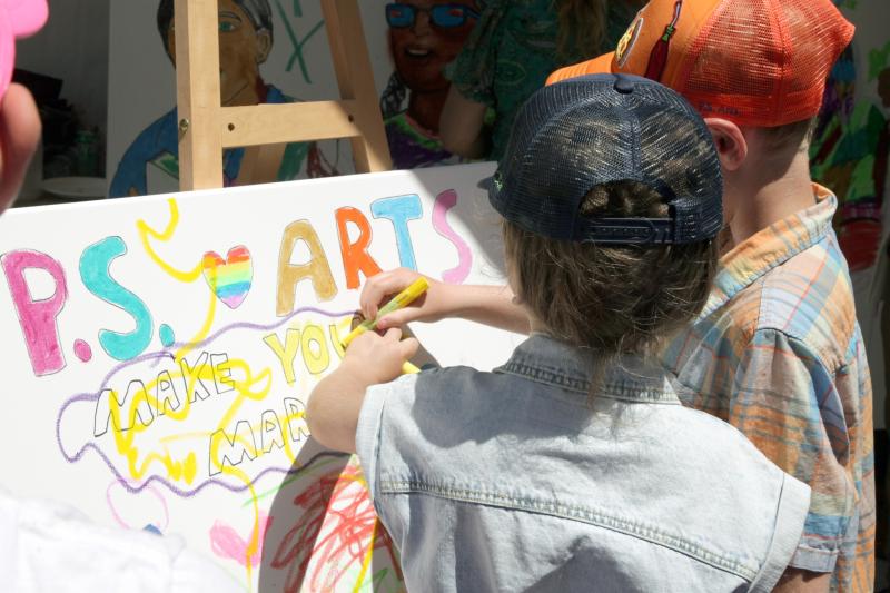 Children coloring at one of their events