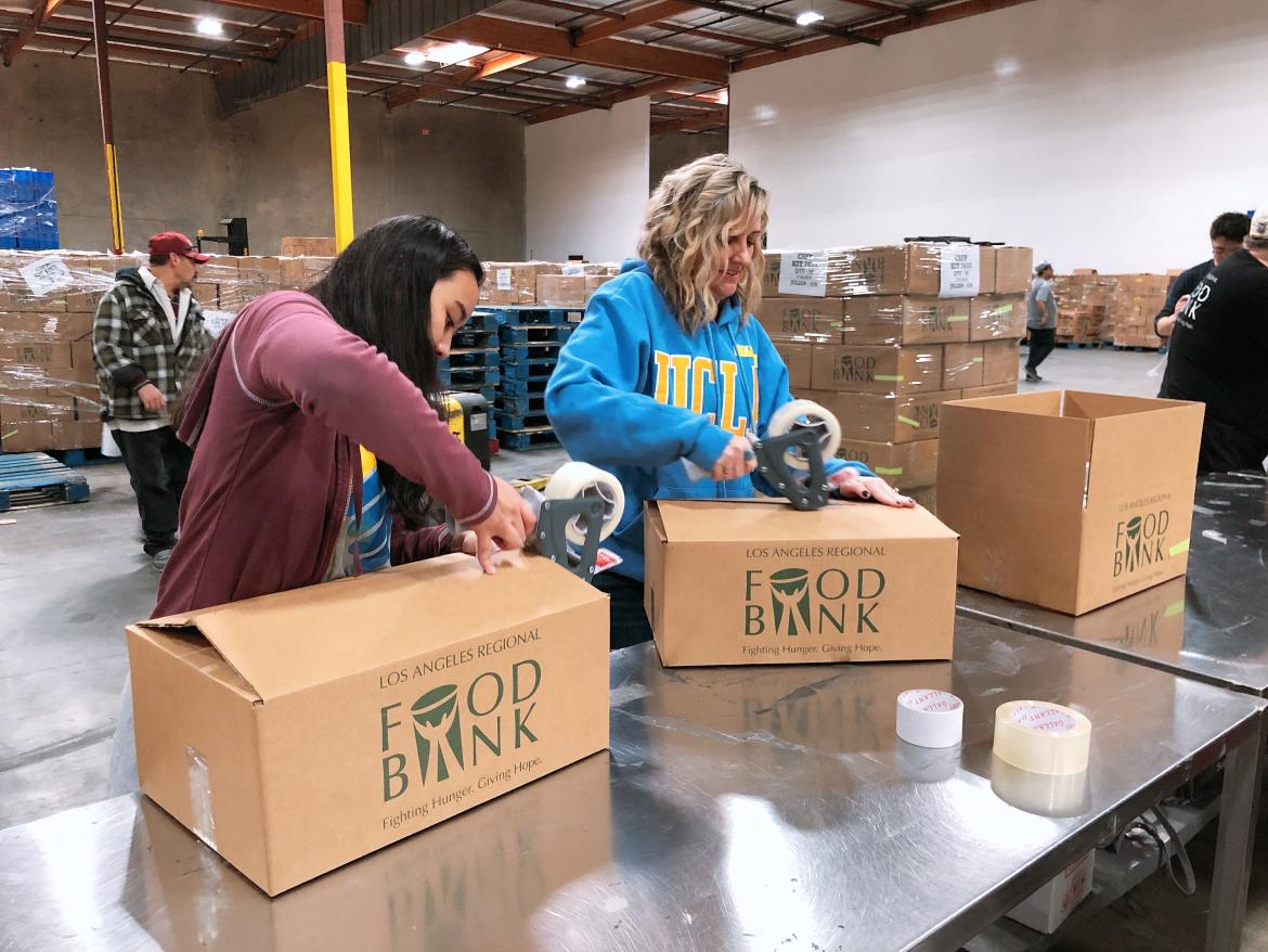 This is a photo of volunteers at the LA Food Bank.