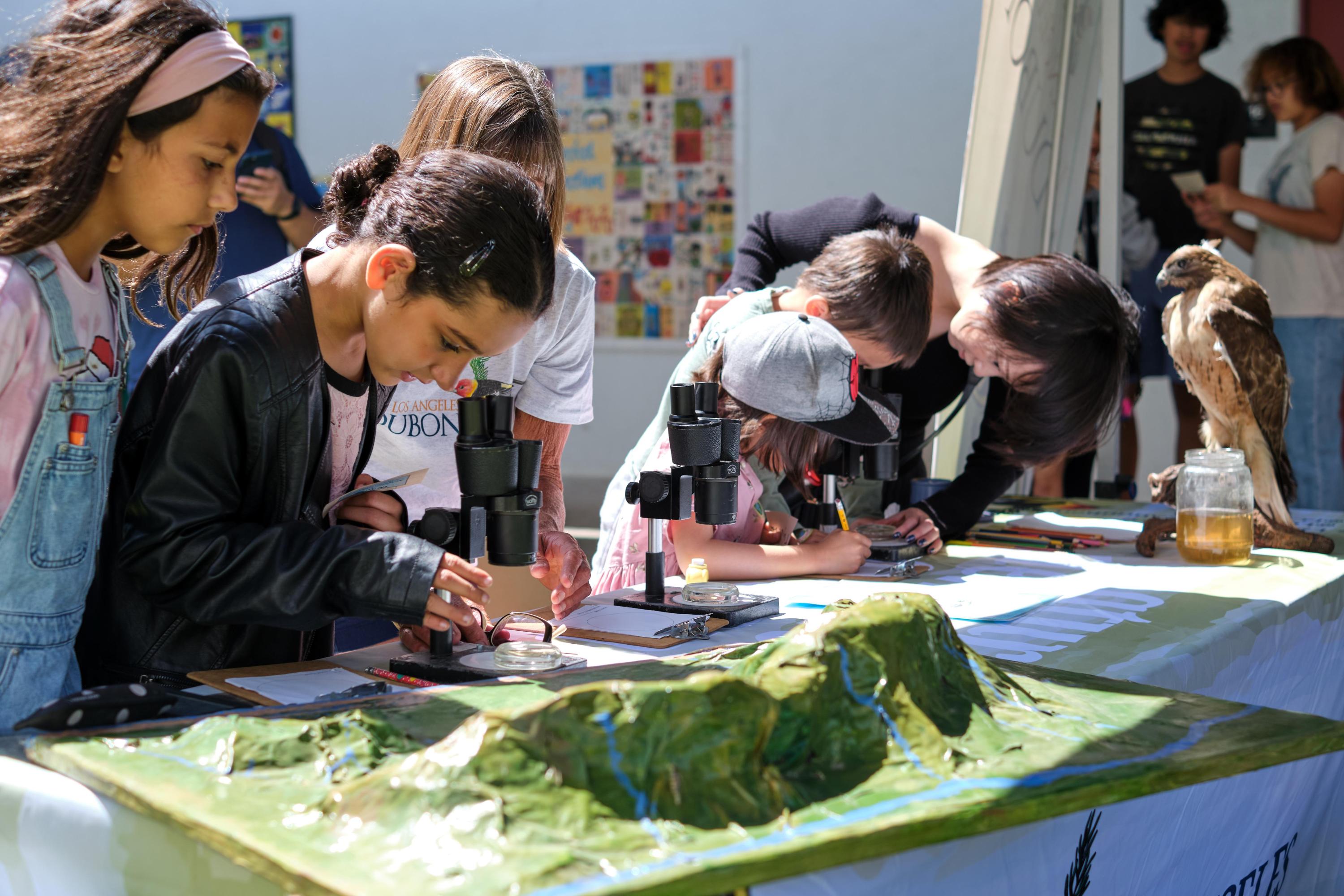 This is a photo of students at an Earth Day event.