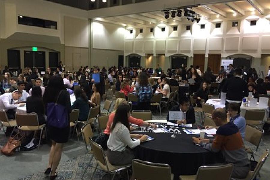 Large ballroom with students interviewing 